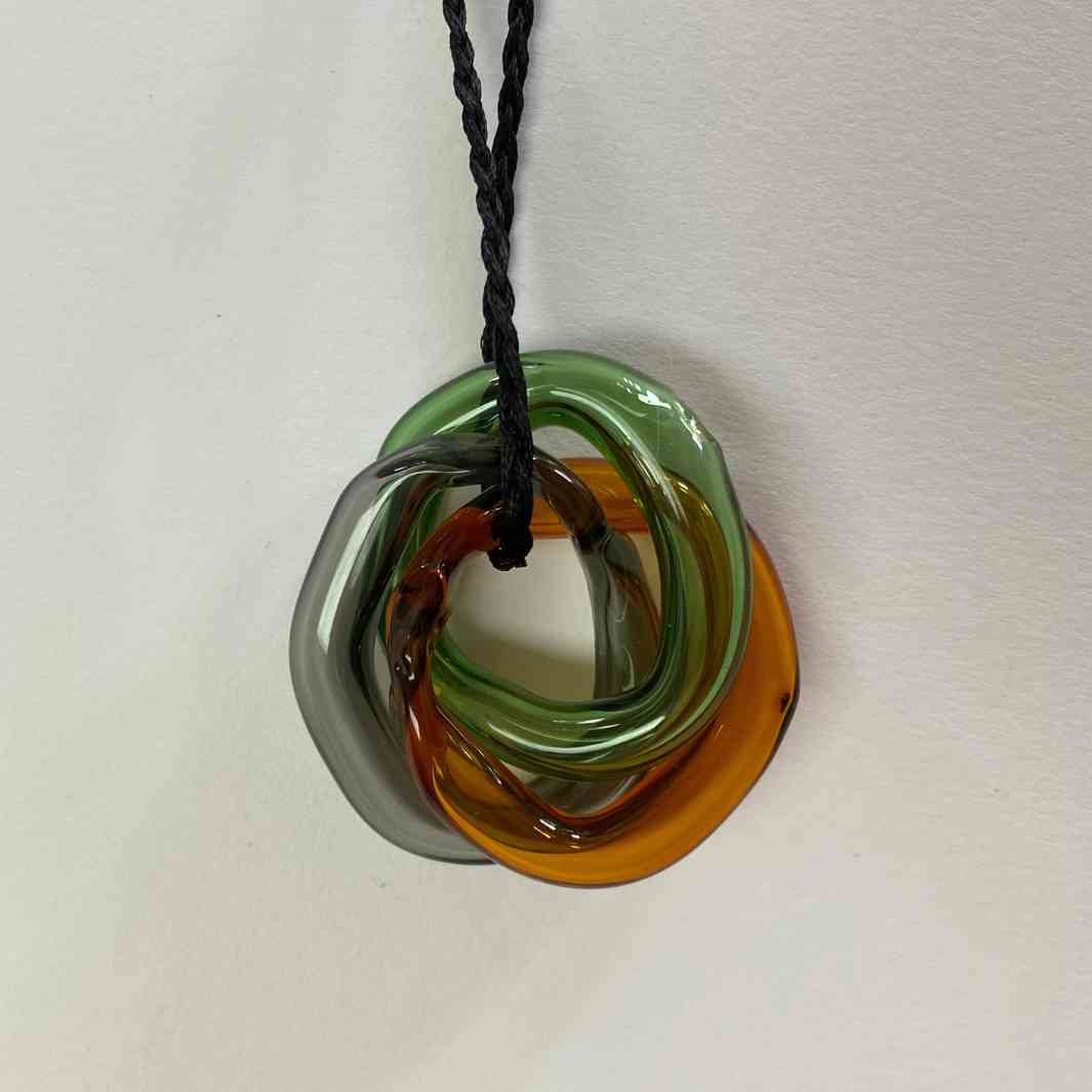 Hollow link pendant by Wearing Glass.
