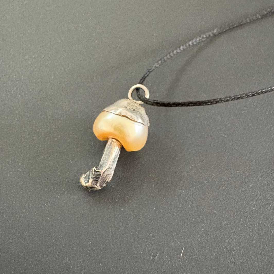 Never the twain | Pearl Mushroom Charm