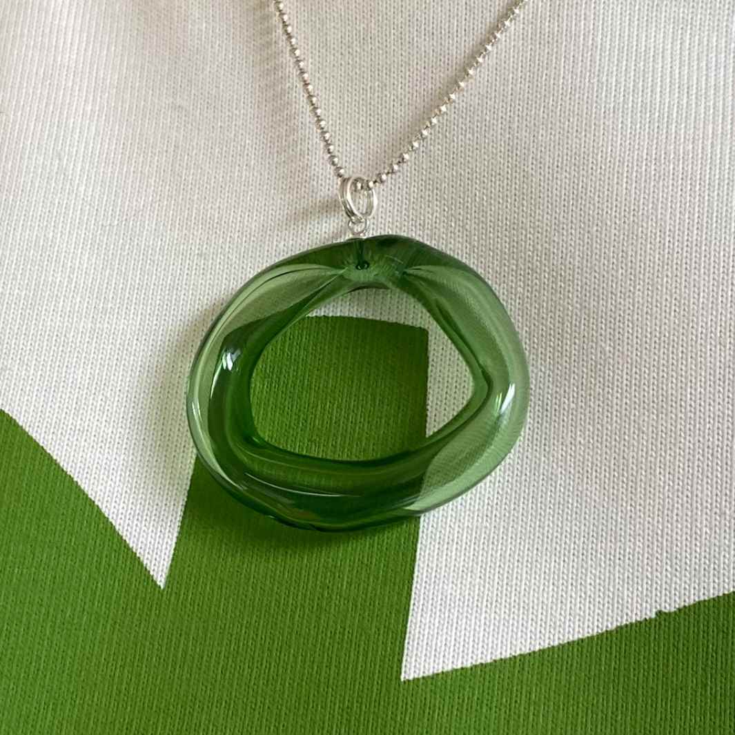 Hollow Loop Pendant | Green | Wearing Glass