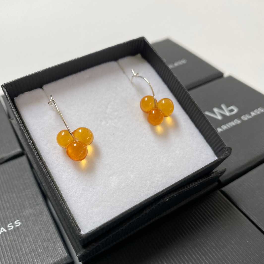 Wearing Glass Bud Hoop Earrings