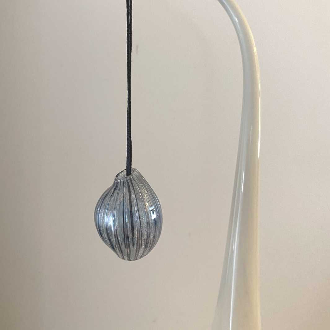 Pod pendant with purple lustre