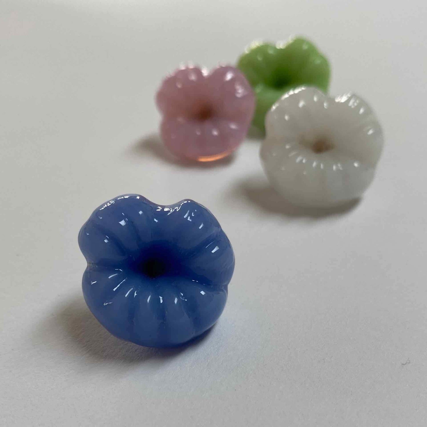 Handcrafted kisses in candy coloured glass - Wearing Glass