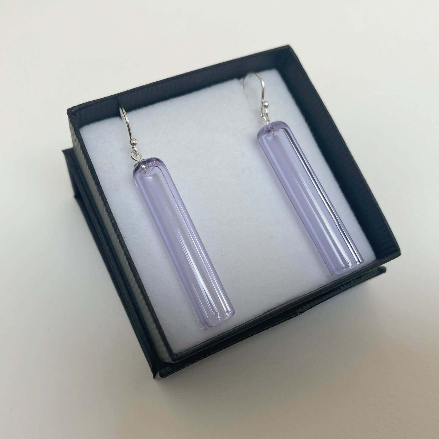 Tube Earrings - Wearing Glass