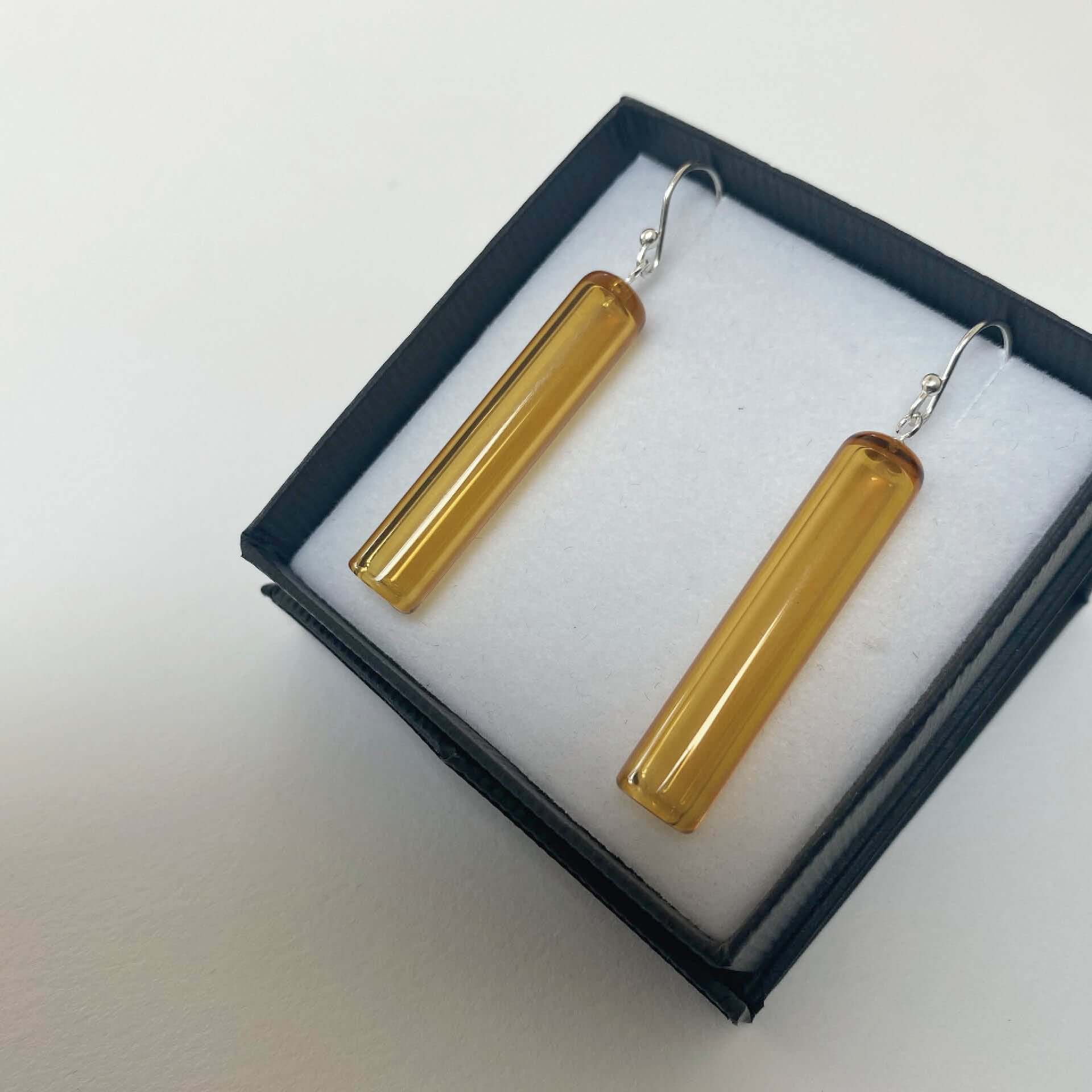 Tube Earrings - Wearing Glass