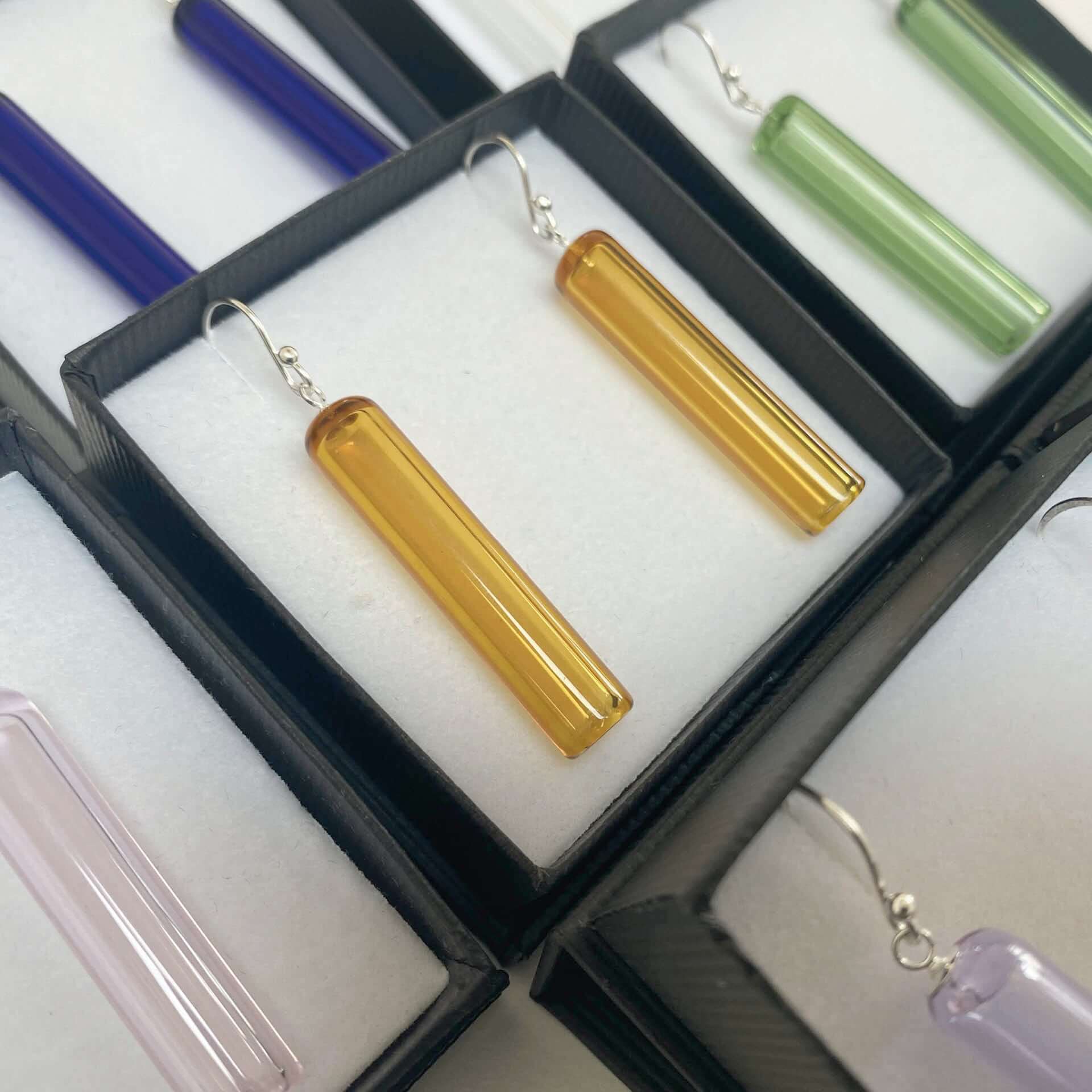 Tube Earrings - Wearing Glass