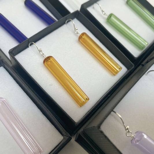 Tube Earrings - Wearing Glass