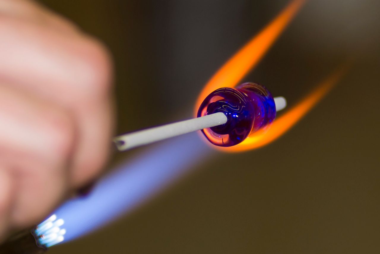 Lampworking a glass bead on the blowtorch