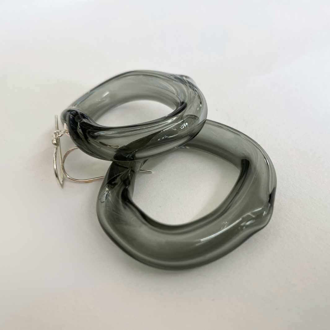 Hollow Loop Earrings | Grey | Wearing Glass