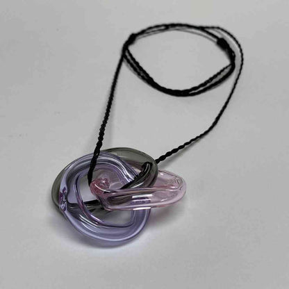 Hollow link pendant by Wearing Glass.