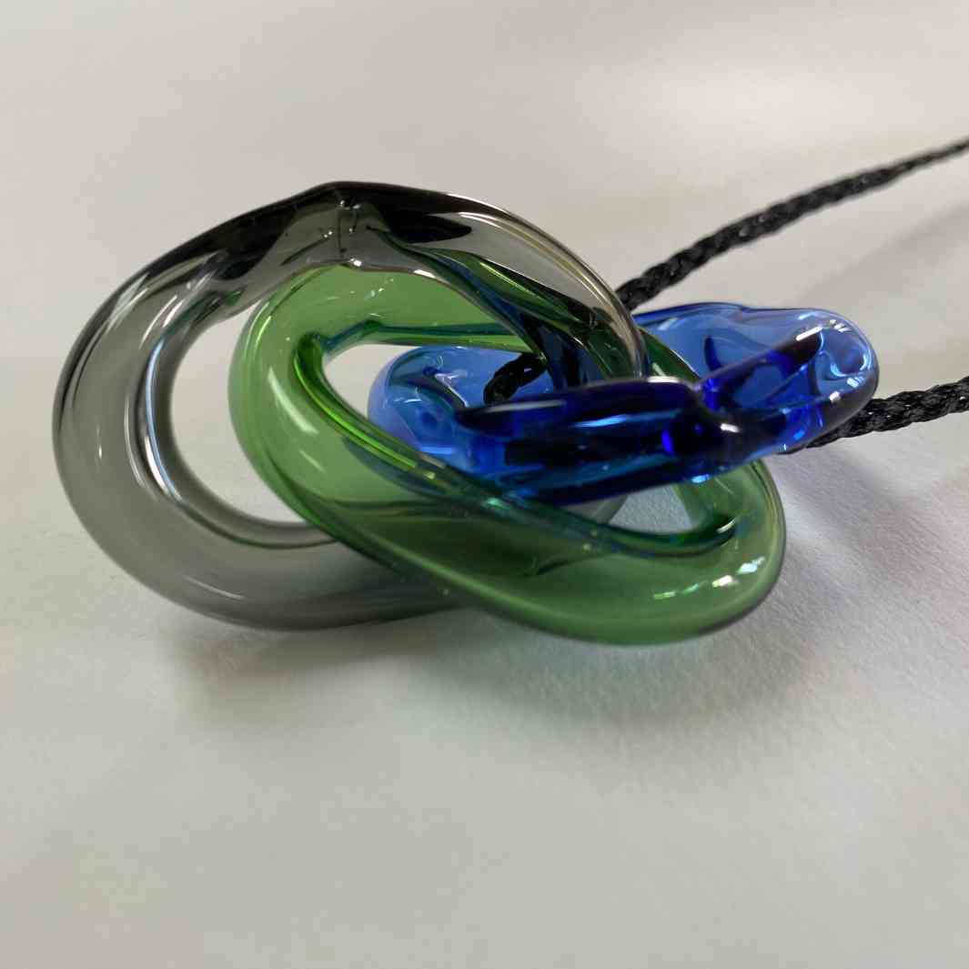 Hollow link pendant by Wearing Glass.