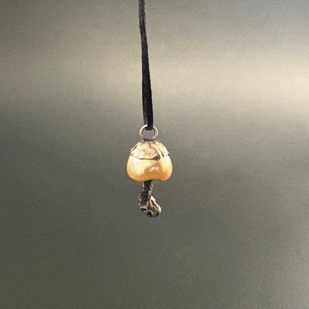 Never the twain | Pearl Mushroom Charm