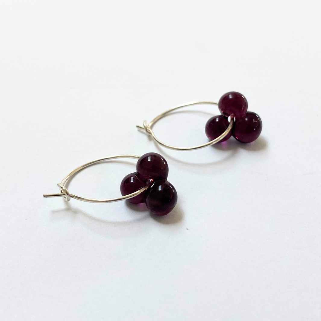 Wearing Glass Bud Hoop Earrings