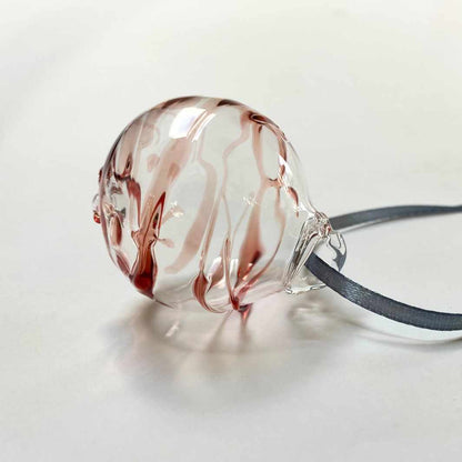 Wearing-Glass-Christmas-Bauble-Red-Swirl