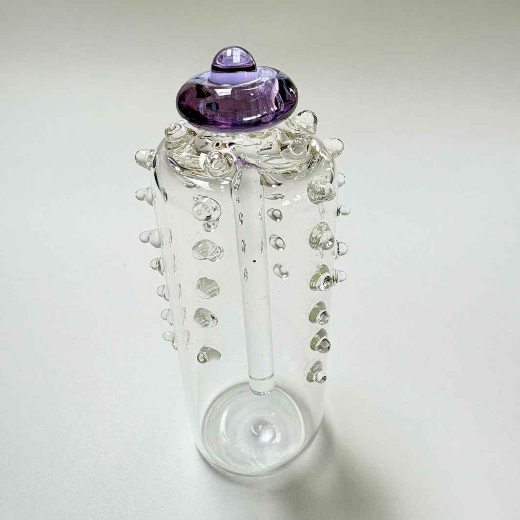 Wearing Glass | Kina Bottle