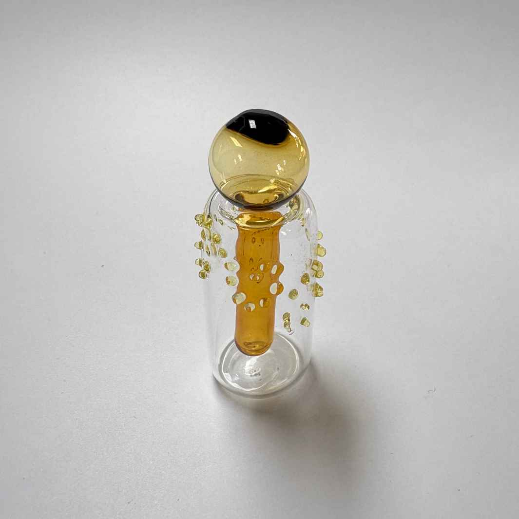 Wearing Glass | Amber Bottle