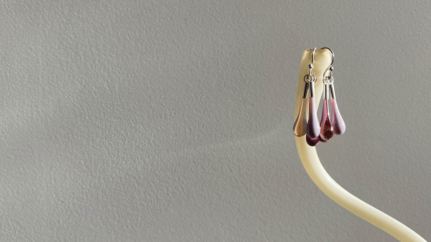 Lampwork droplet earrings in pink glass with sterling silver findings.